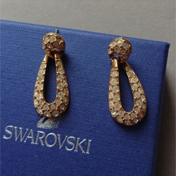 Swarovski Jewelry - Gold tone Swarovski dangle earrings